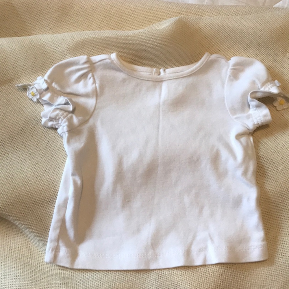 White tshirt with flower detail. 6-12 m